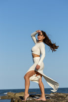Side angle of Zokkibee Bella long sleeve crop top in cotton with modern cropped fit