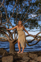 Front angle of Zokkibee Bianca cotton dress with fitted knitted silhouette