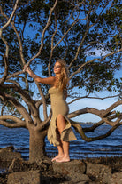 Side angle of Zokkibee Bianca cotton dress with fitted knitted silhouette