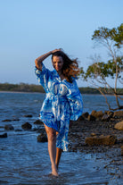 Front view of Zokkibee Magic Garden linen shirt dress with button-down design and relaxed fit