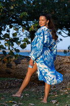 Side angle of Zokkibee Magic Garden linen shirt dress highlighting shirt collar and easy fit