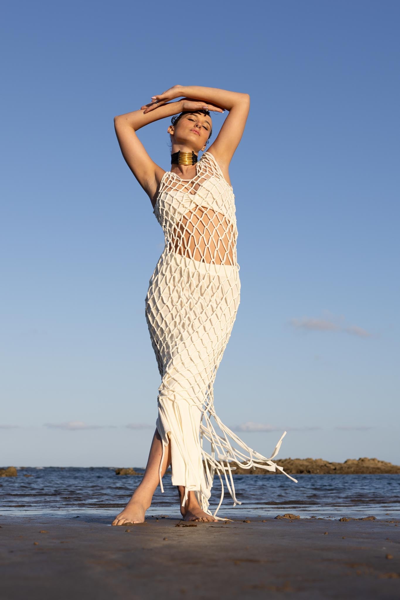 Front view of Zokkibee Asanti choker necklace with leather band and gold plated brass accents