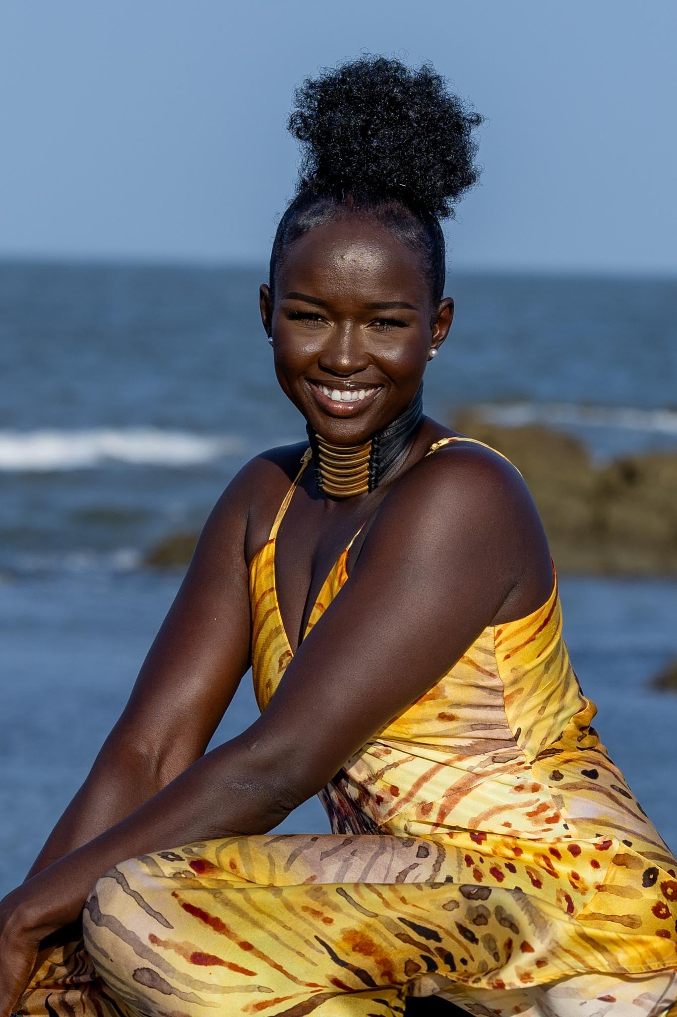 Front view of Zokkibee Asanti choker necklace with leather band and gold plated brass accents