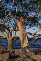 Front view of Zokkibee asymmetric knitted top with unique asymmetric cut and textured knit