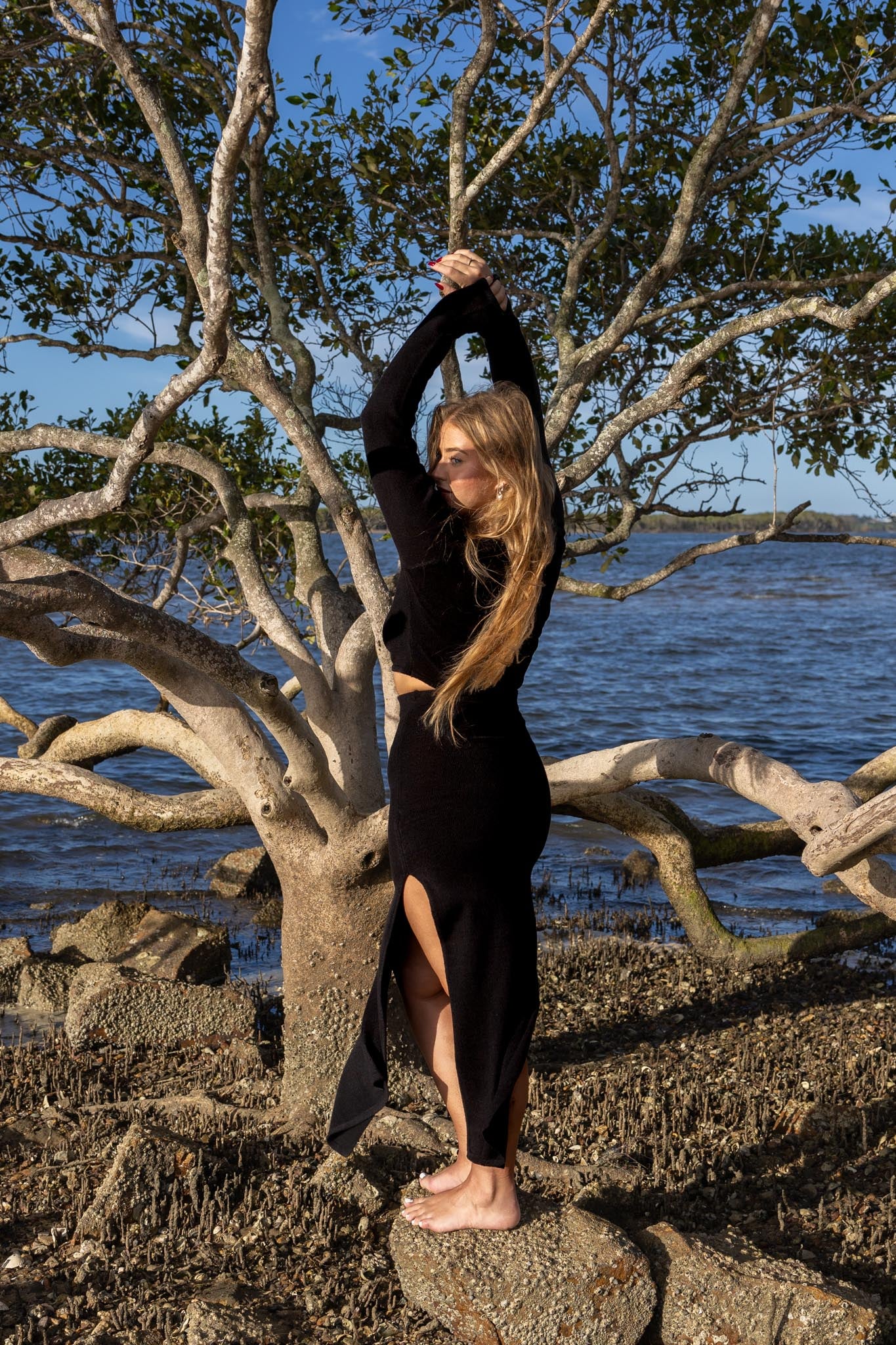 Back view of Zokkibee Bella long sleeve cotton crop top with fitted silhouette