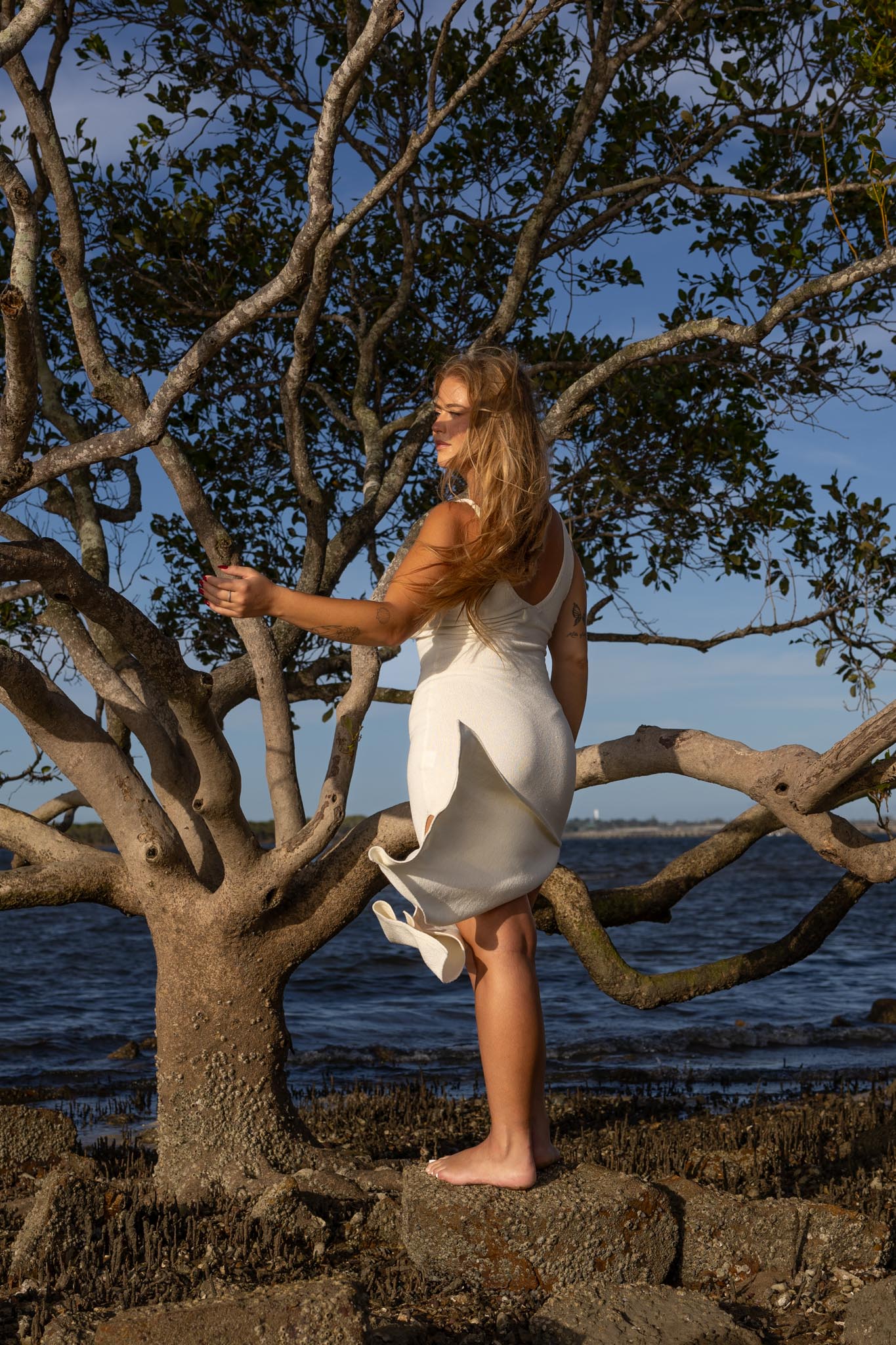 Back view of Zokkibee Bianca knitted cotton dress showing soft cotton knit details