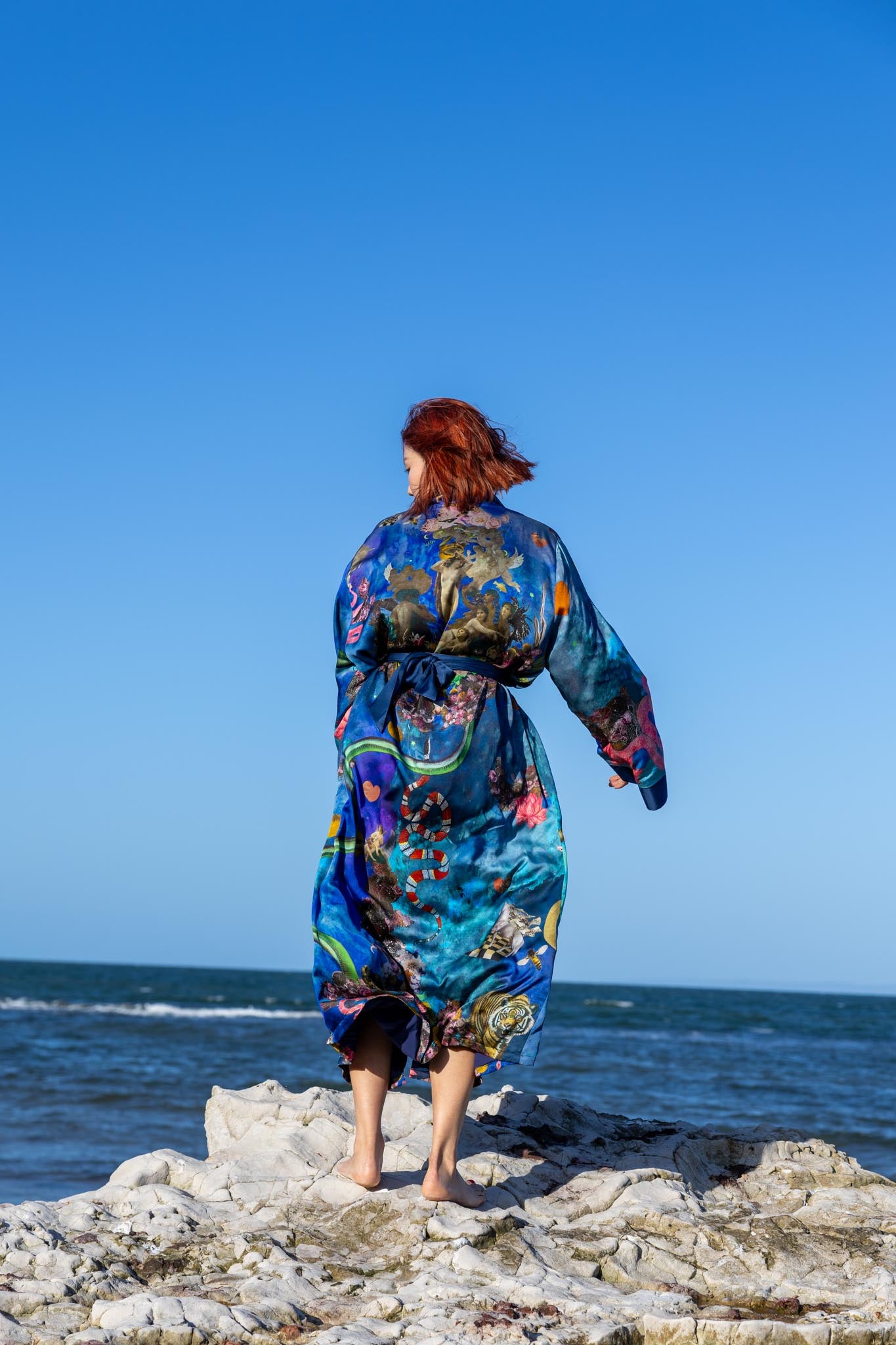 Back view of Birth of Venus kimono showing detailed artwork and elegant drape