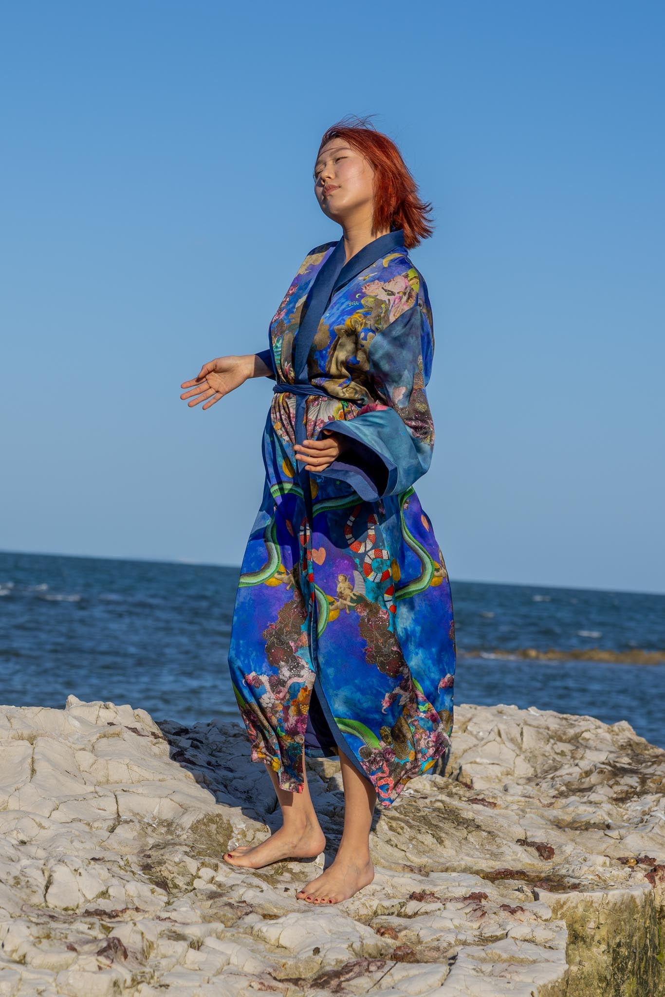 Front view of Zokkibee Birth of Venus kimono featuring artistic print and flowing silhouette