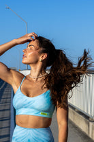 Front view of Zokkibee blue tiger leggings and crop top set with bold blue tiger print and high-waisted fit