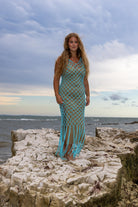 Front view of Zokkibee Inka Sapphire fringe dress in blue, featuring artisan macramé knots and flowing fringe.