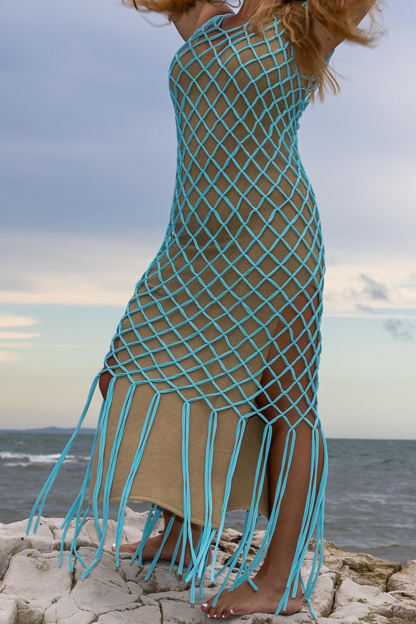 Detailed view of vibrant blue fringe on Inka Sapphire dress with macramé knots by Zokkibee.