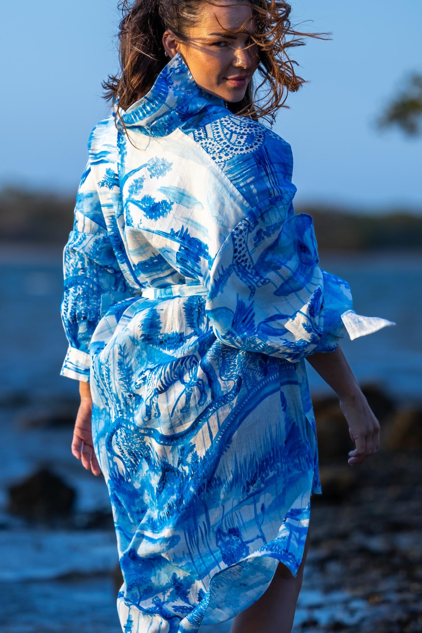 Model wearing Zokkibee Magic Garden linen shirt dress styled for modern, versatile fashion