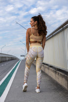 Back view of Nomad leggings and crop set showing all-over print and fitted silhouette