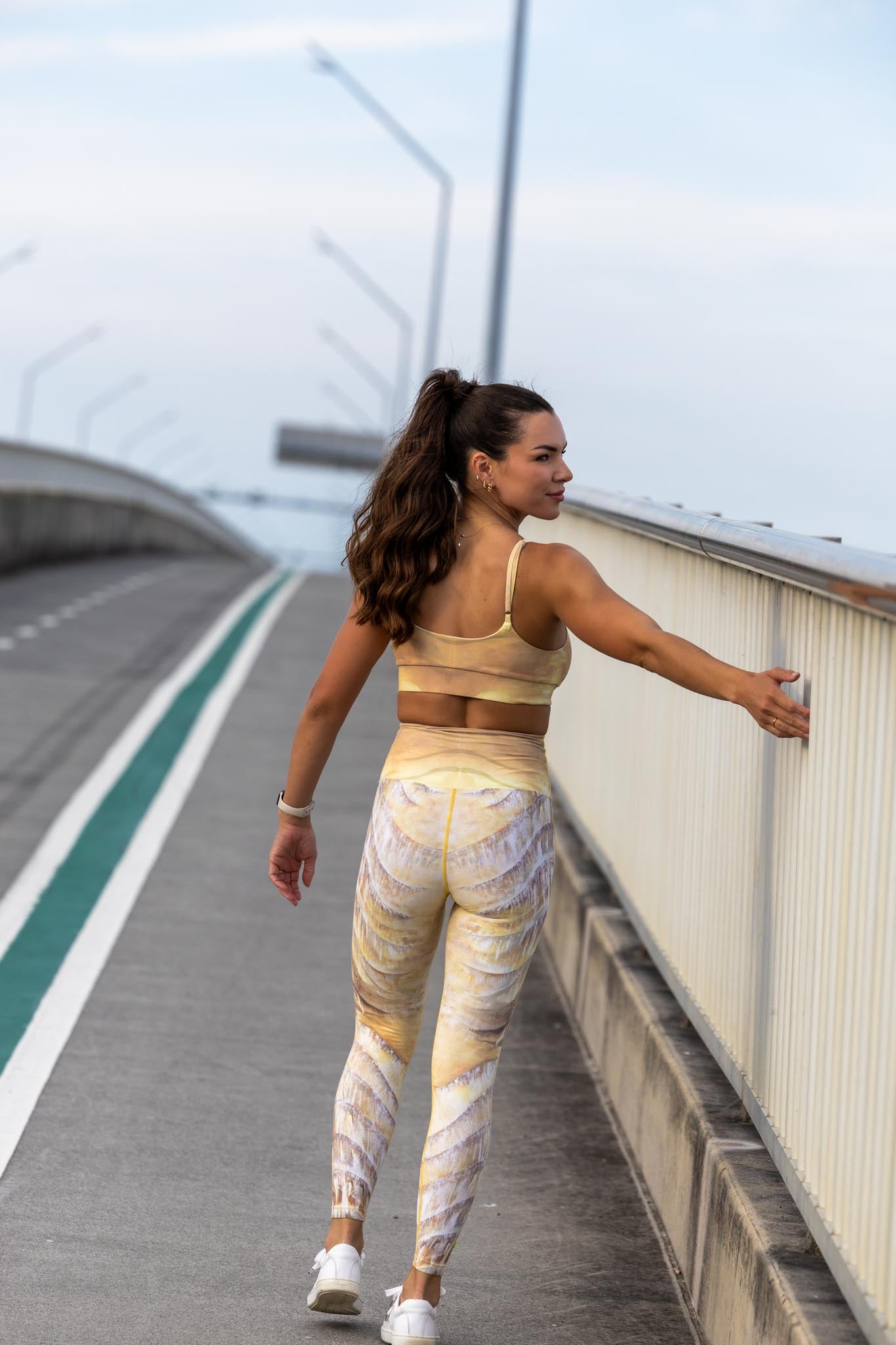 Back view of Nomad leggings and crop set showing all-over print and fitted silhouette