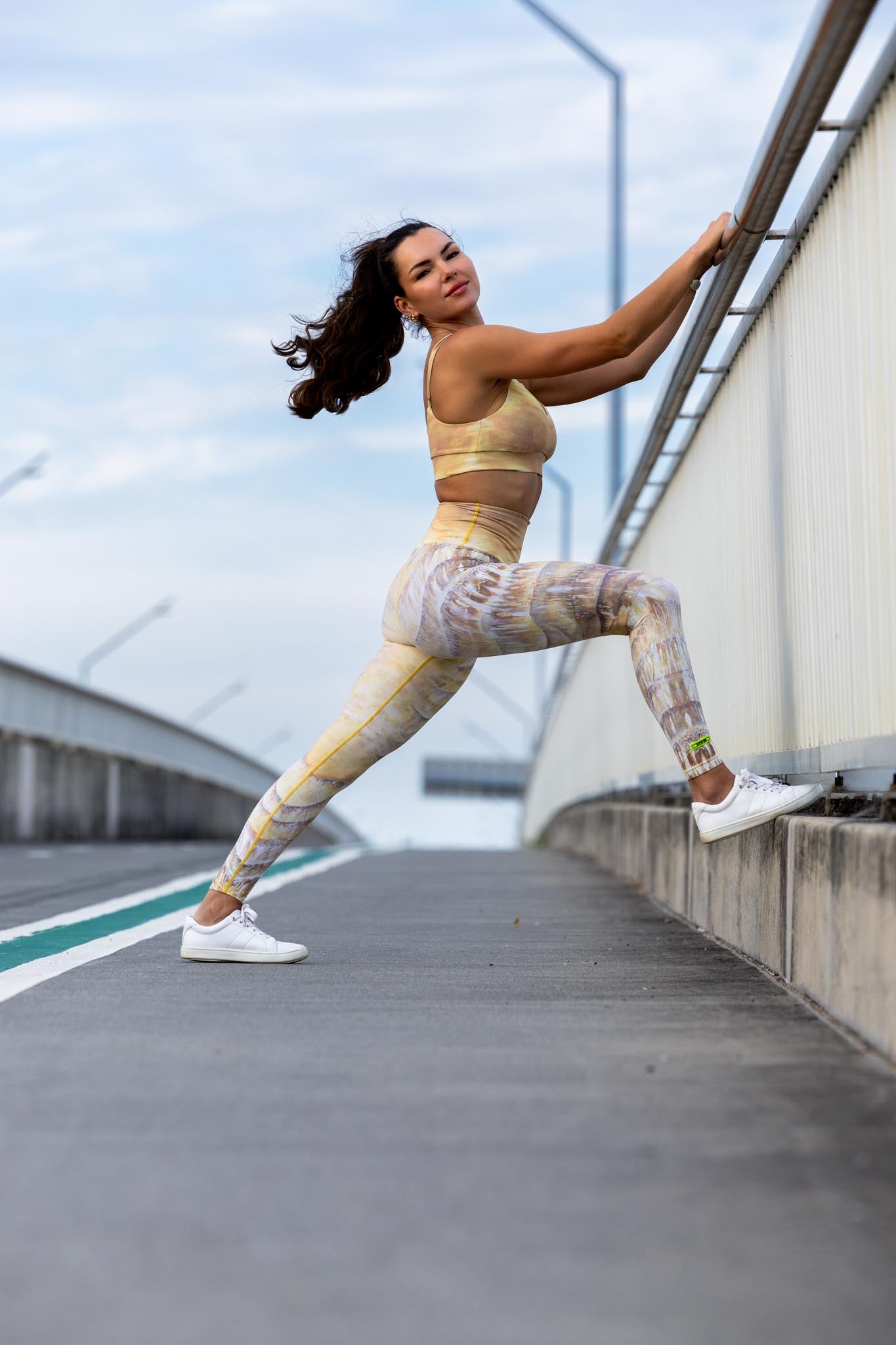 Side angle of Zokkibee Nomad leggings and crop top highlighting stretch fabric and modern design