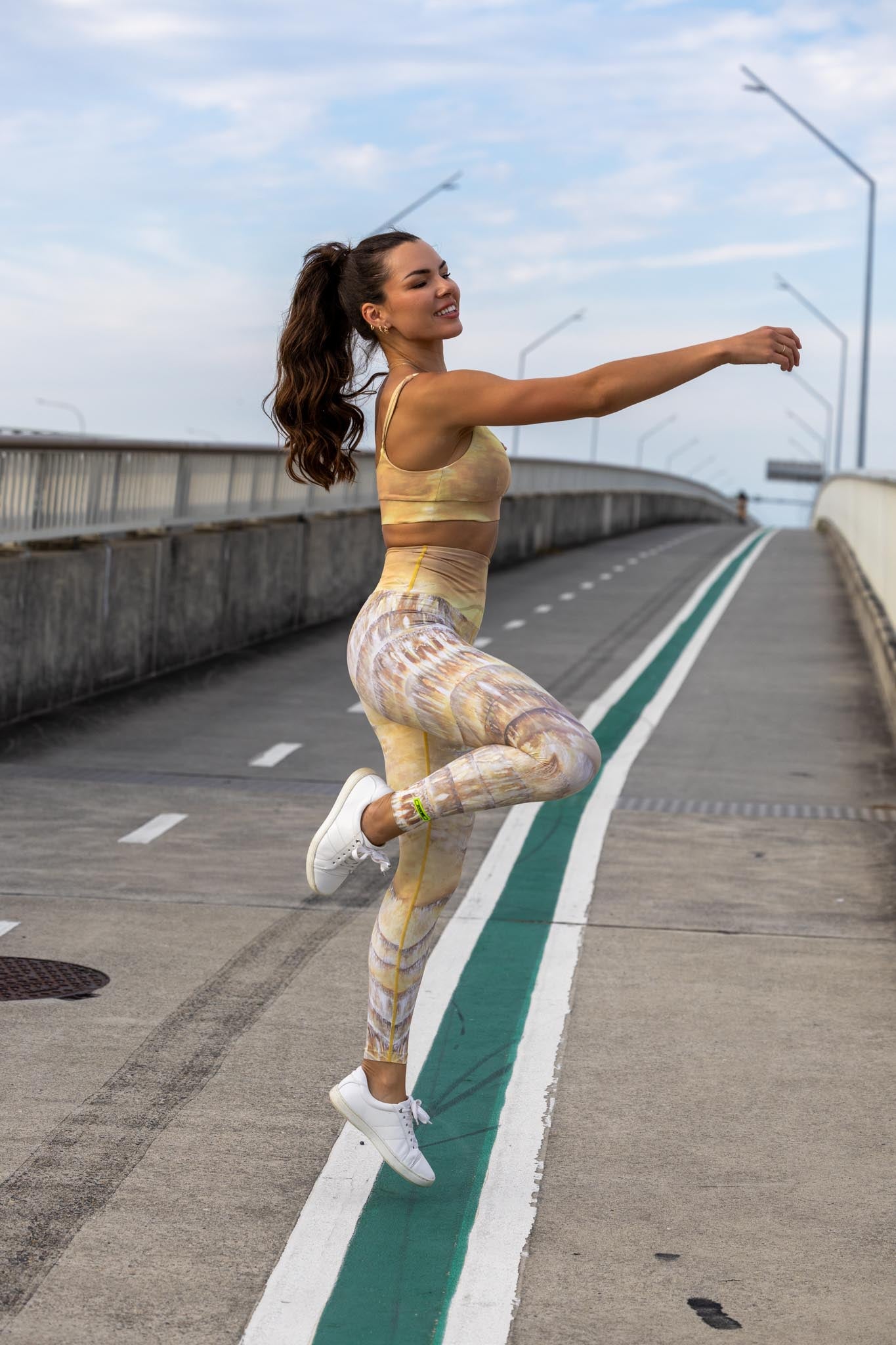 Side angle of Zokkibee Nomad leggings and crop top highlighting stretch fabric and modern design