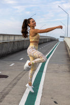 Side angle of Zokkibee Nomad leggings and crop top highlighting stretch fabric and modern design