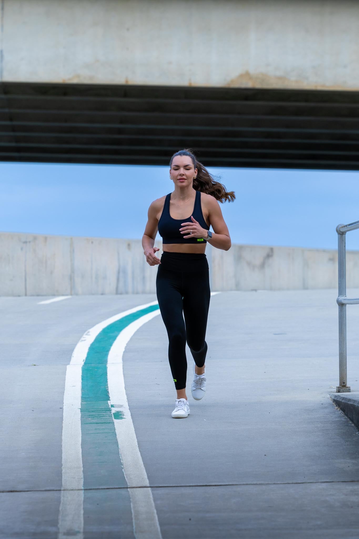 Front view of Zokkibee Onyx crop top and leggings set in solid black with high-waisted fit