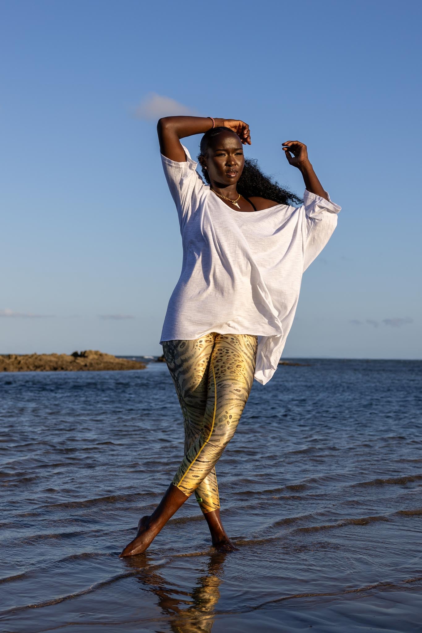 Model wearing Zokkibee oversized t-shirt styled for relaxed, casual fashion