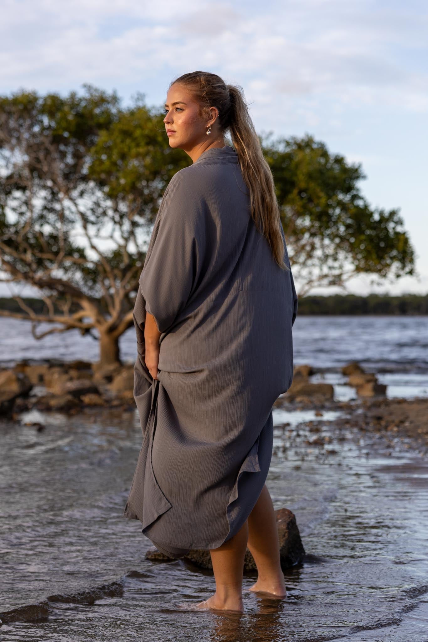 Back view of Vacanza dress showing oversized silhouette and loose fit