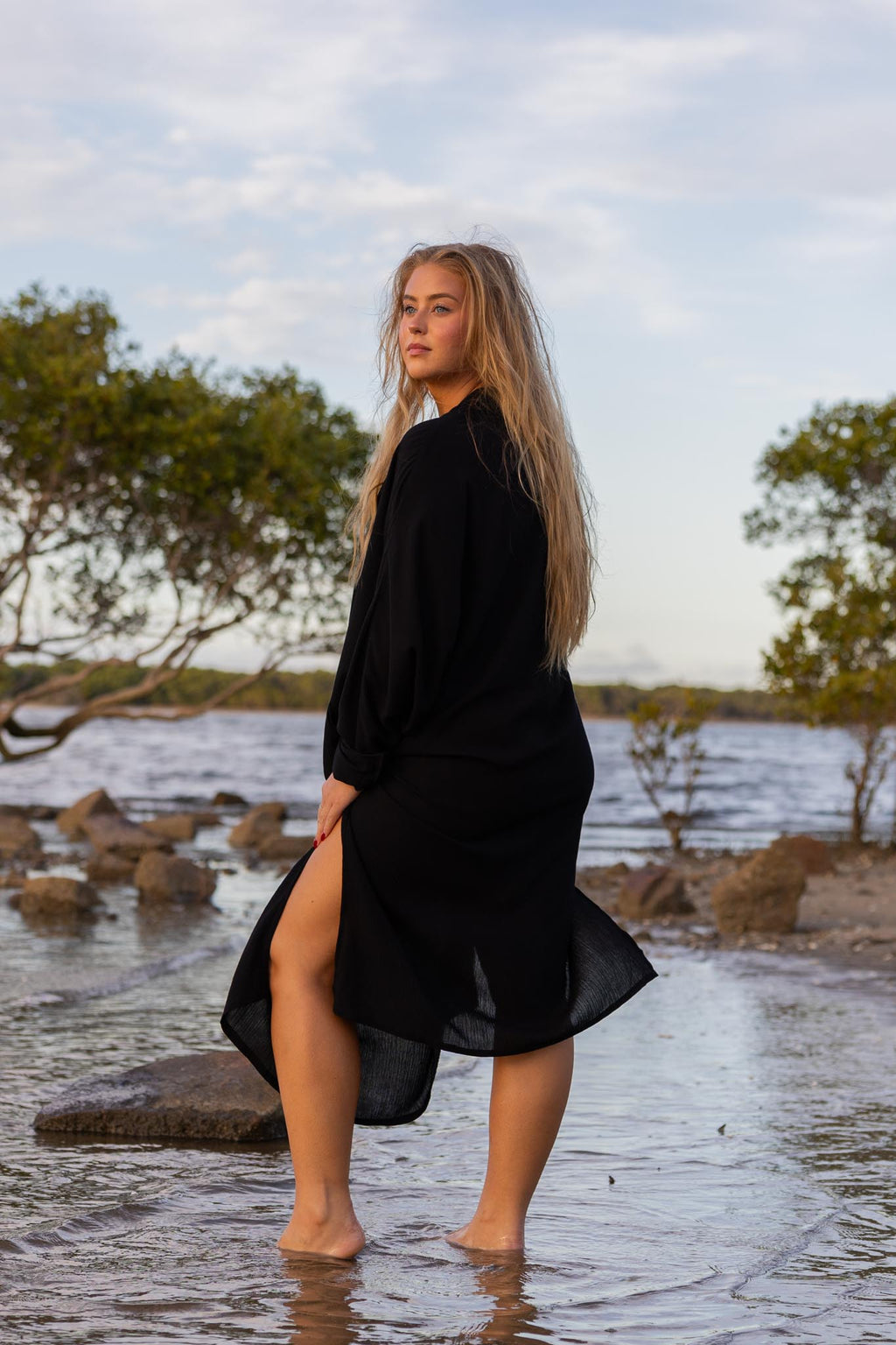 Back view of Vacanza dress showing oversized silhouette and loose fit
