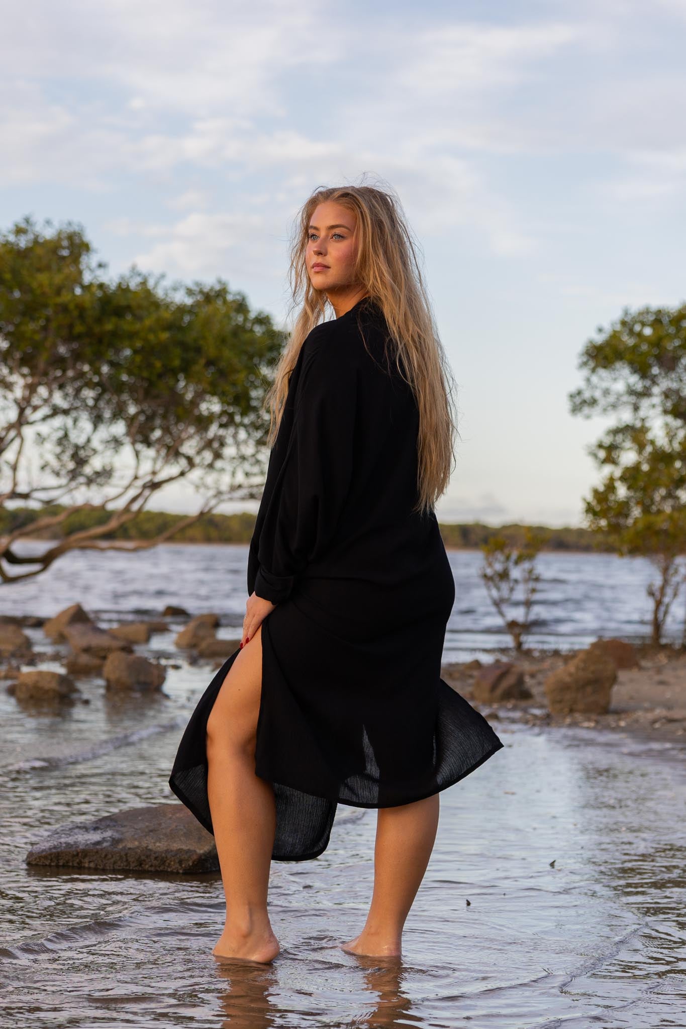 Back view of Vacanza dress showing oversized silhouette and loose fit