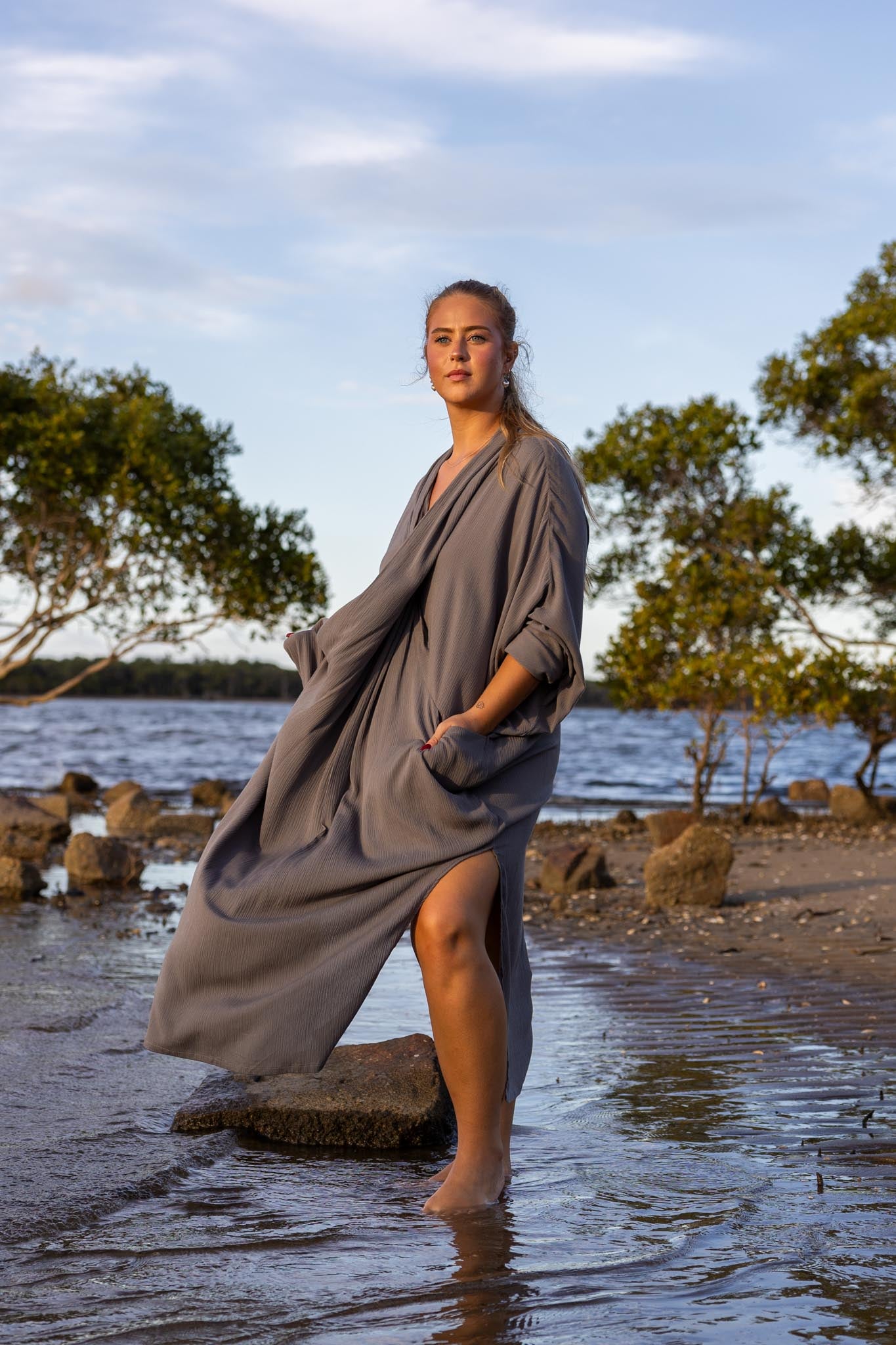 Side angle of Zokkibee Vacanza dress highlighting relaxed, draped style