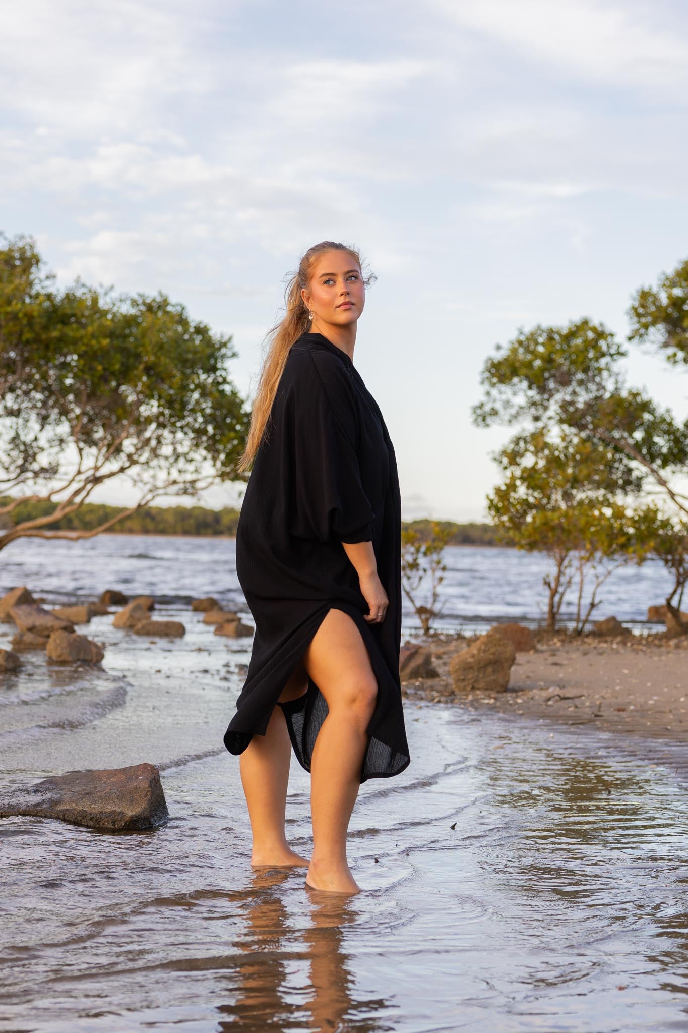 Side angle of Zokkibee Vacanza dress highlighting relaxed, draped style