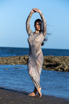 Front view of Zokkibee zebra mesh dress with sheer mesh fabric and bold zebra print